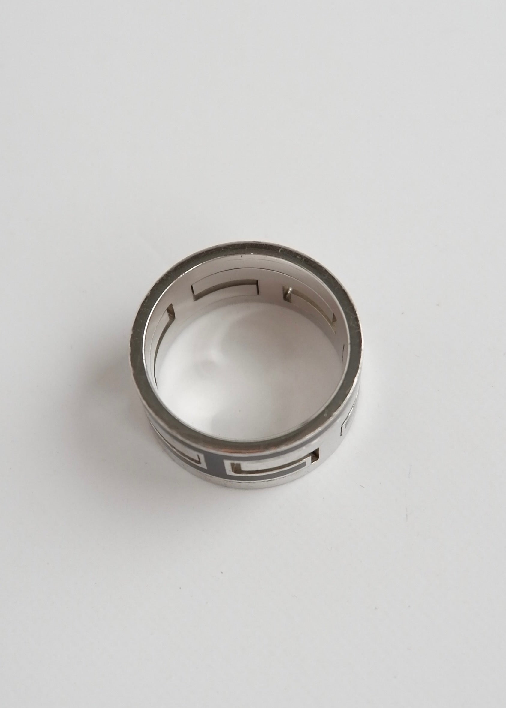 Authentique bague Hermes d'occasion Move H Noire/Argentée
