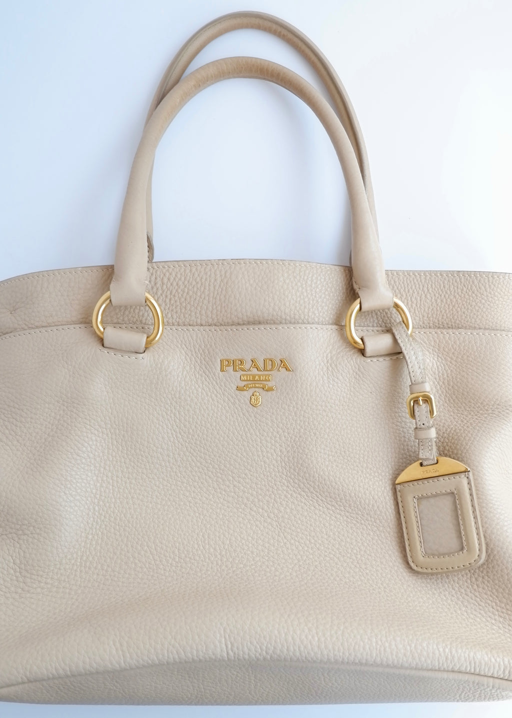 Sac cabas/bandoulière Prada en cuir beige, authentique, d'occasion