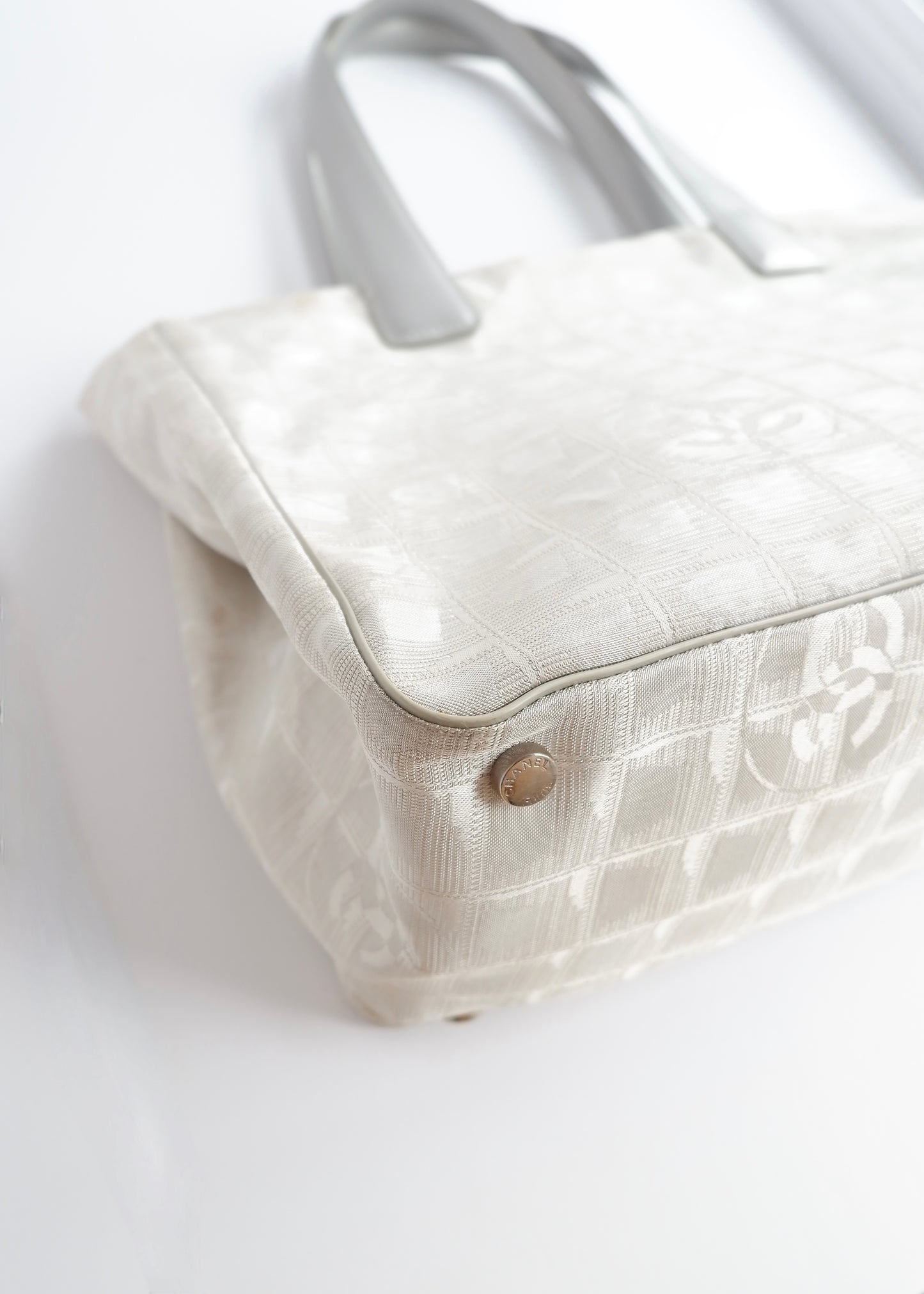 Authentic Preowned Chanel Silver Canvas New Travel Line Tote Bag