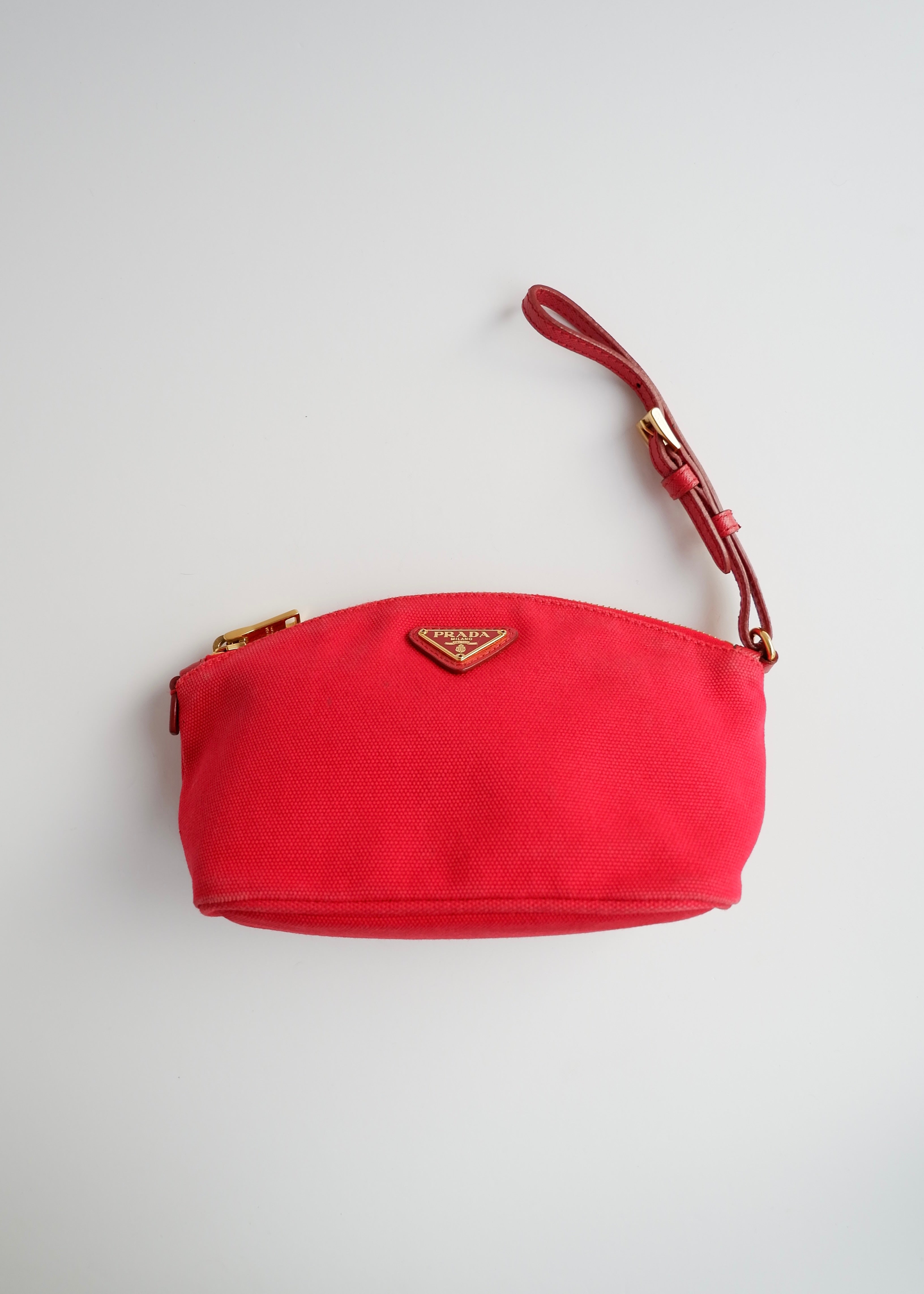 Pochette Prada en toile rouge authentique d'occasion