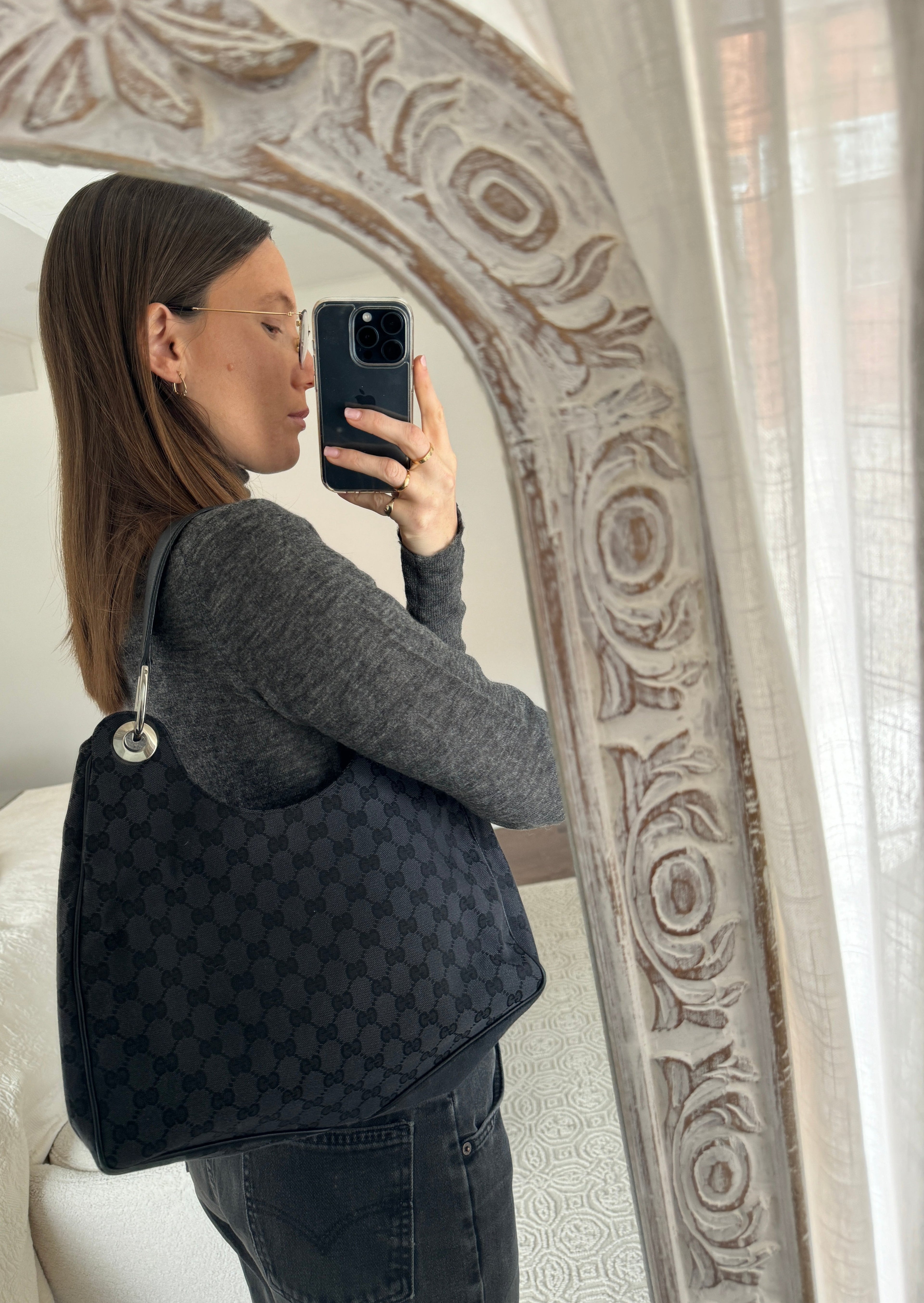 Authentique Sac à bandoulière Gucci en toile GG noire d'occasion