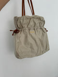 Authentique Sac fourre-tout Prada en nylon et cuir beige d'occasion